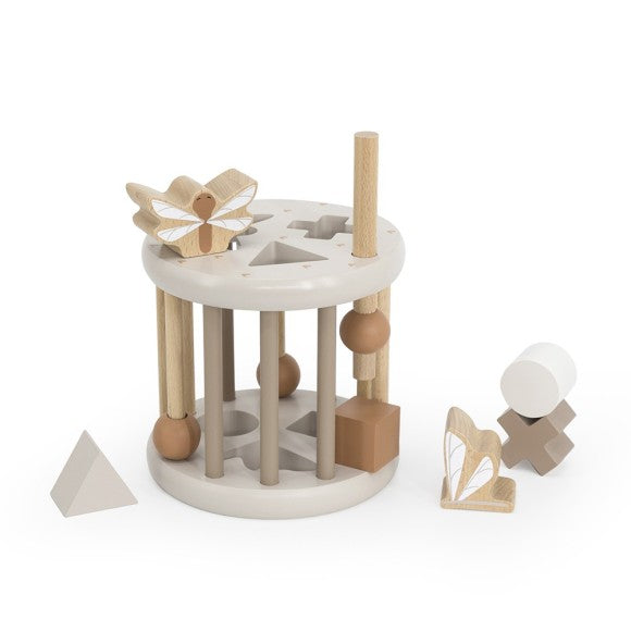 Ein Sortierrad mit Gittern und mehrere Klötzchen in beige.